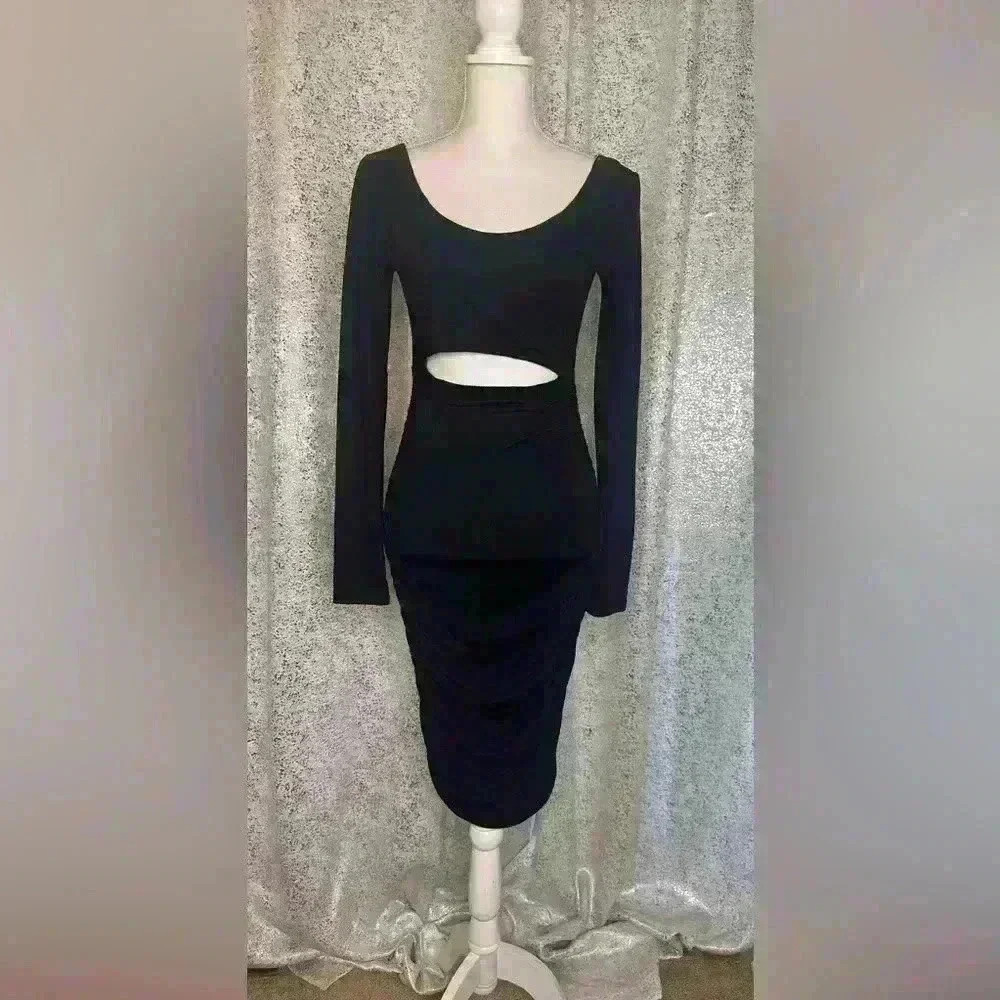 NWOT Black jersey cut out dress.